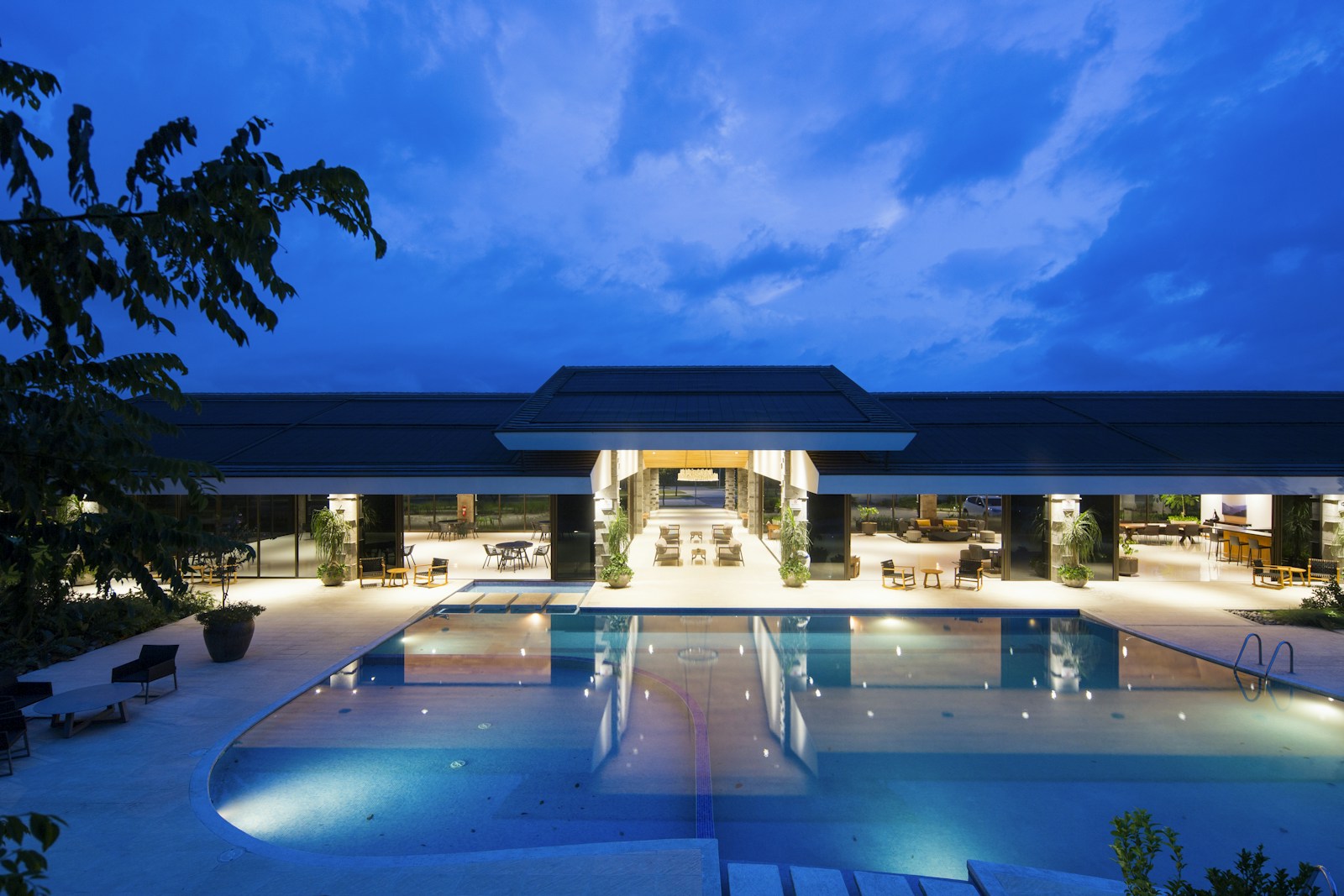 The Orchard Villa illuminated evening villa pool